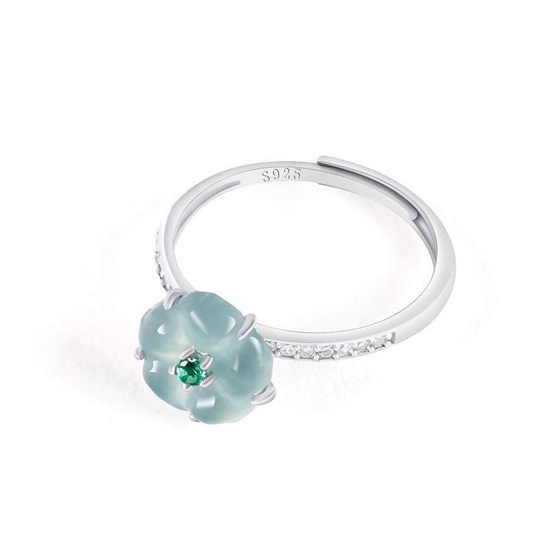 BoxUnboxed adjustable ring featuring a blue water jadeite peach blossom, green accent, and cubic zirconia in platinum.