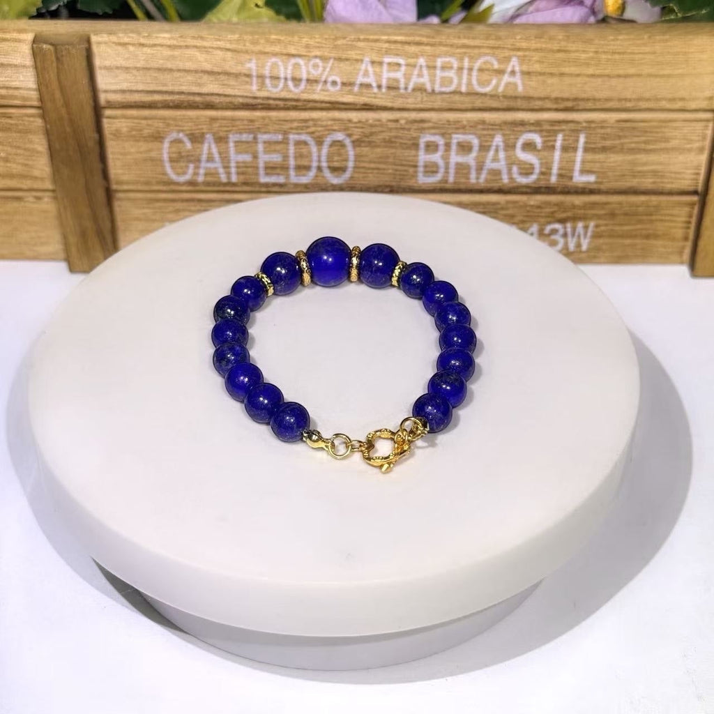 BoxUnboxed Afghan Lapis Lazuli beaded bracelet with gold-plated accents and a secure gold toggle clasp.