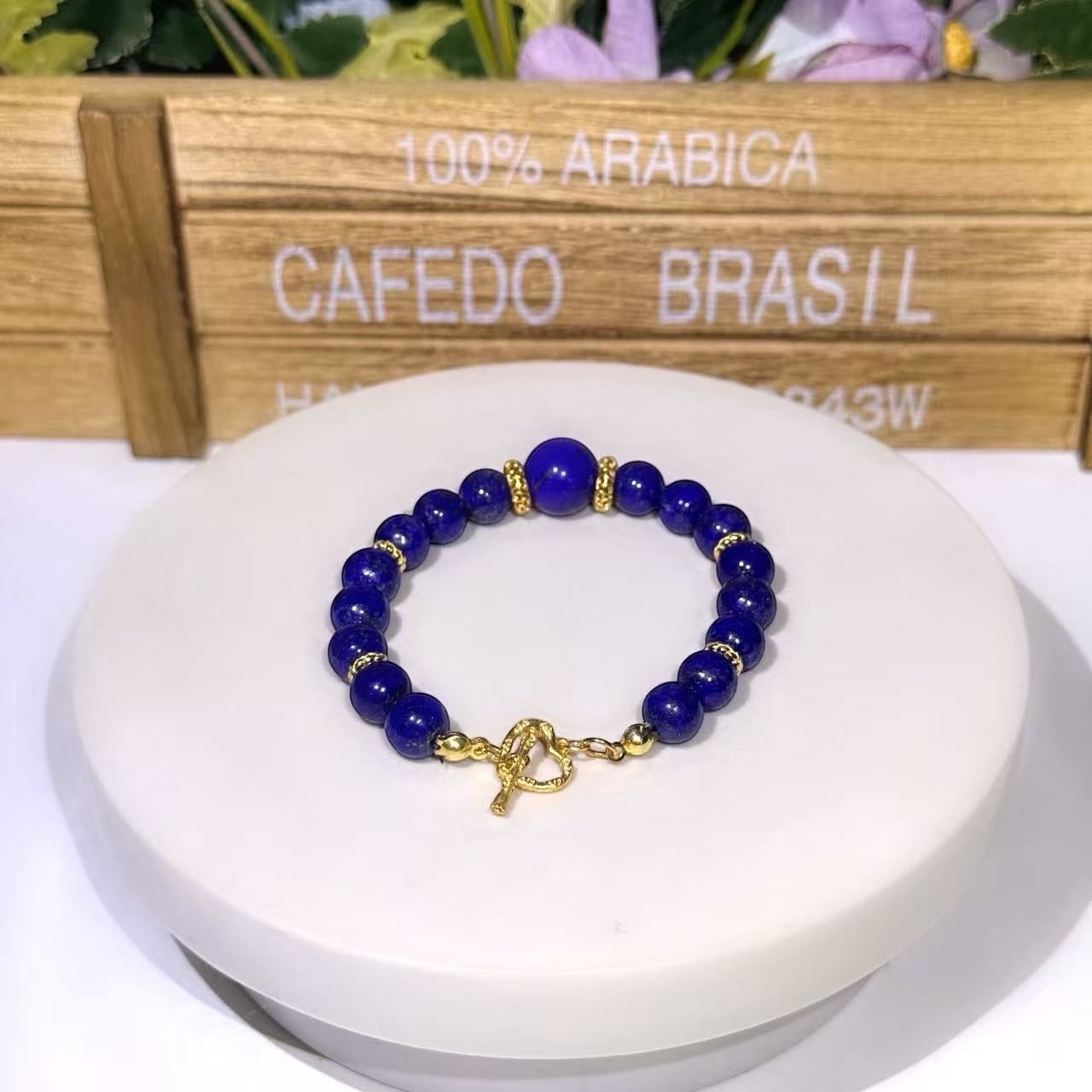 BoxUnboxed natural Afghan Lapis Lazuli bracelet with gold-plated accents and a secure gold OT toggle clasp.