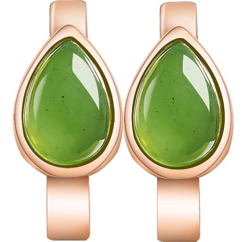 BoxUnboxed huggie earrings featuring teardrop-shaped natural nephrite jade in rose gold plated sterling silver bezels.