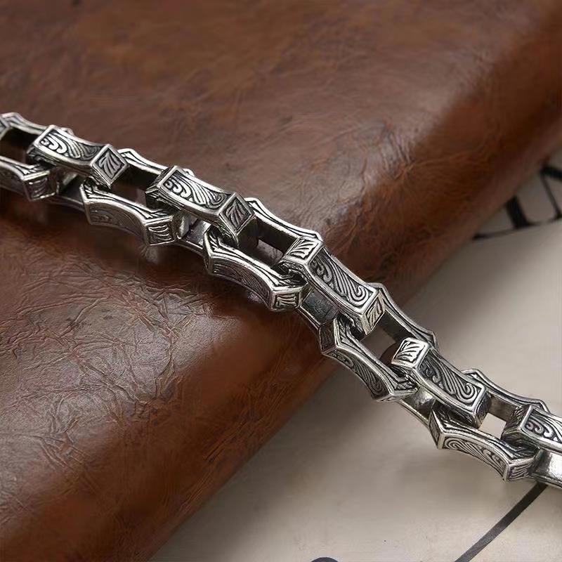 BoxUnboxed The Rock Sovereign geometric link bracelet in solid 925 silver with a 10mm profile and chiseled rock facets.