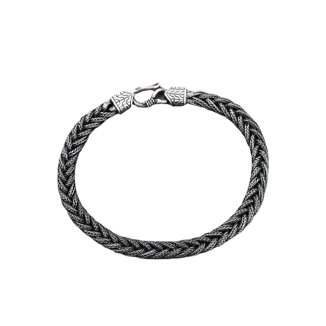 BoxUnboxed Sovereign Viking Vajra braided link chain bracelet in solid 925 sterling silver with oxidized patina and hook clasp.